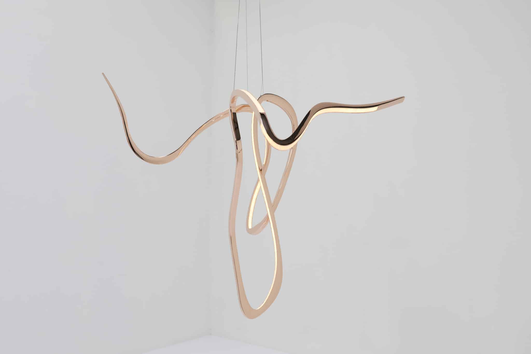 Niamh Barry Artist's hand V bronze suspended light sculpture 4.
